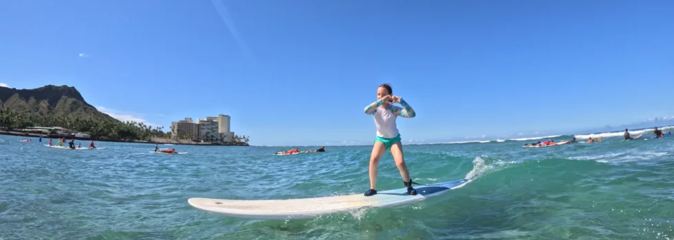 Kid surfing waikiki