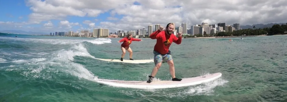 Surfing in waikiki clear water