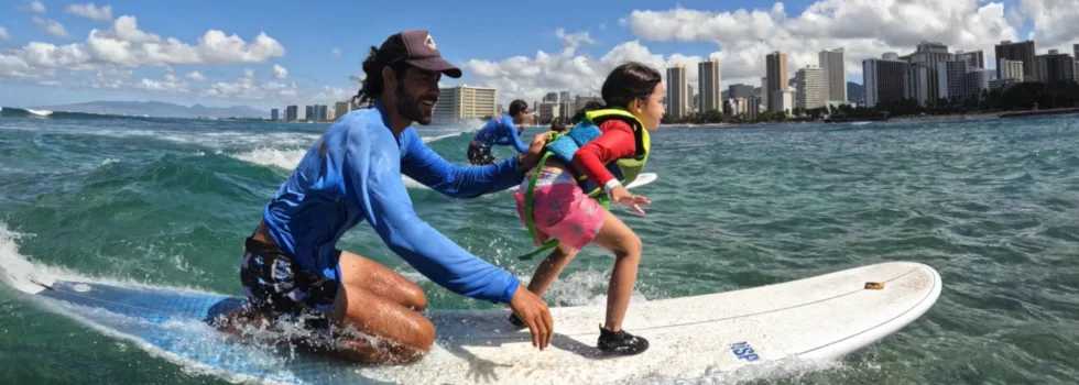 Tandem surfing with waikiki instructor