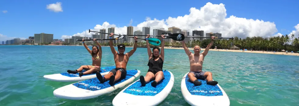 Family tries sup in waikiki