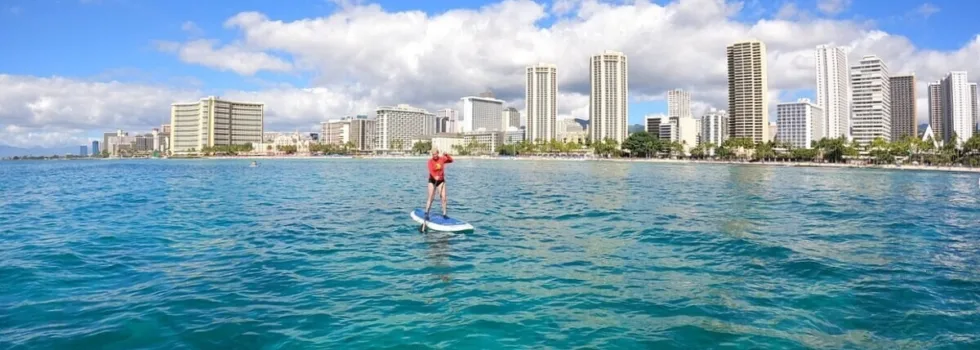 Woman sup in beautiful waikiki