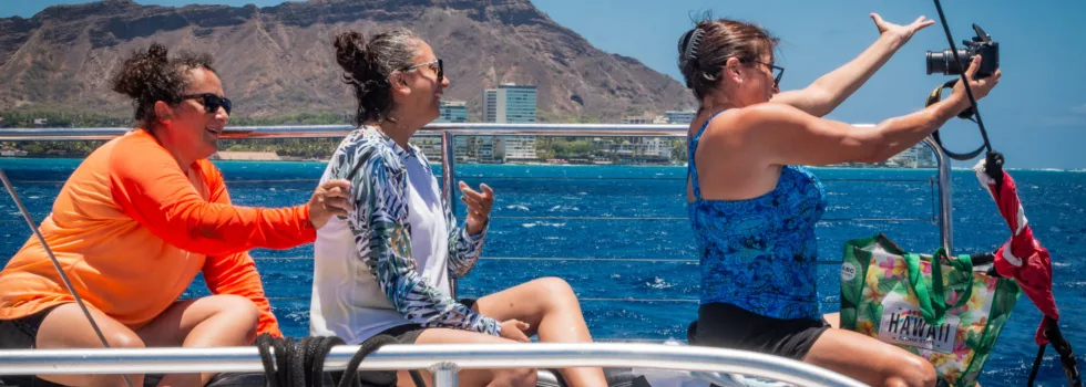 Grou taking selfie on waikiki catamaran