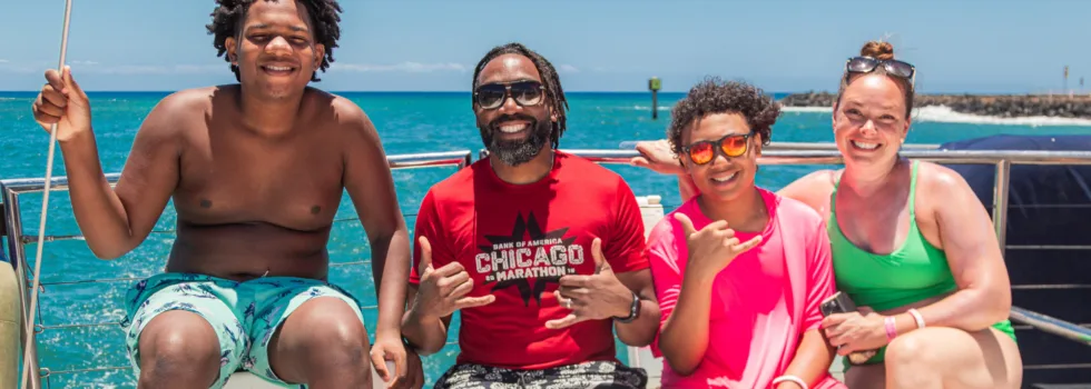 Happy family photo on waikiki catamaran