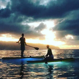 Glow Paddle Boarding under the Moonlight