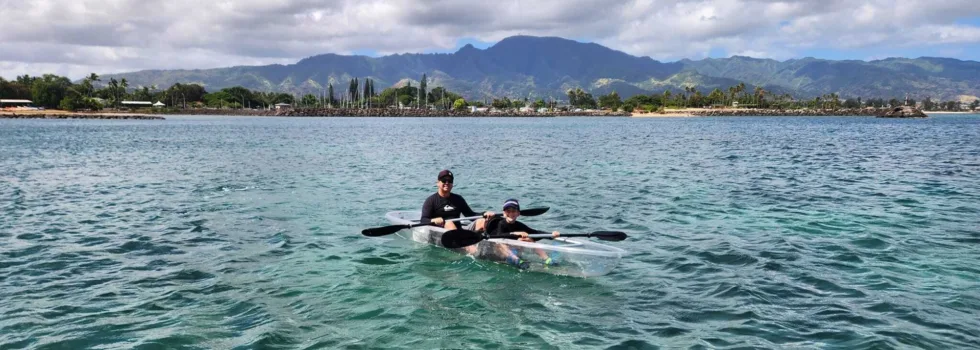Father son glass bottom kayak haleiwa
