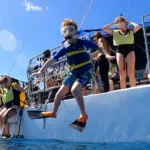 Kid jumps off waikiki trimaran
