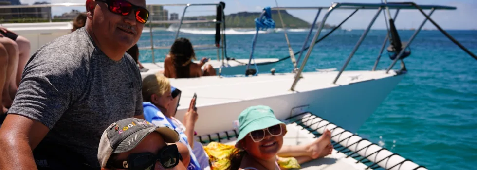 Happy guests on waikiki trimaran