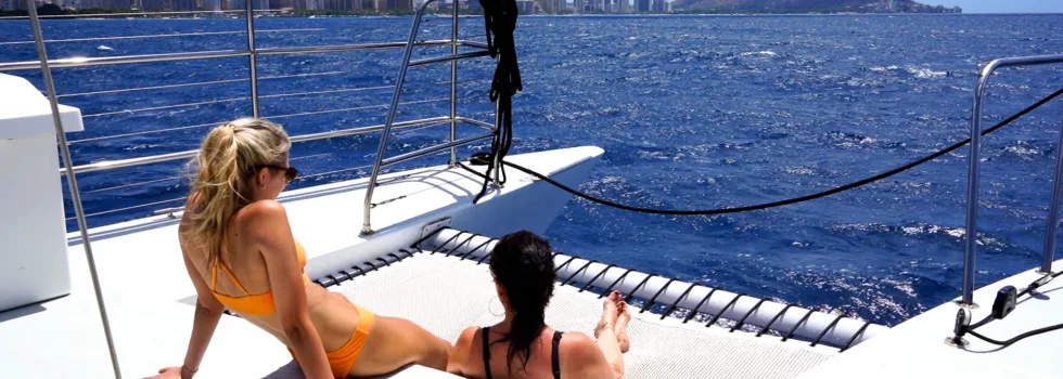 Lounging on waikiki catamaran