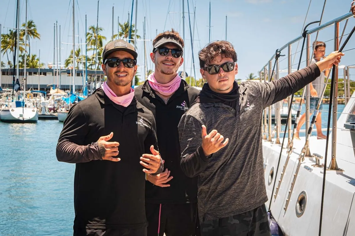 Welcoming crew of the turtle canyon snorkeling tour saying goodbye