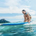 Girl surf lesson waikiki hawaii