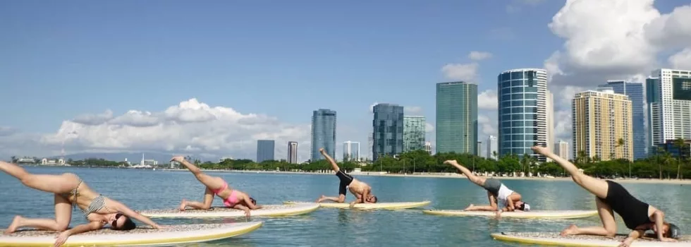 Do yoga on SUP board waikiki